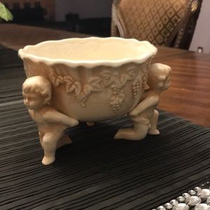 Antique Porcelain bowl with cherubs